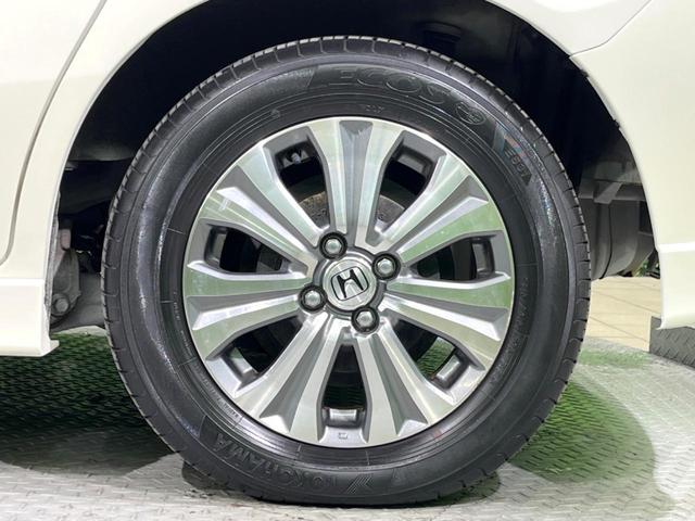 フリードハイブリッド ジャストセレクション 両側電動ドア 純正SDナビ バックカメラ 禁煙車 ハーフレザーシート スマートキー HIDヘッド ビルトインETC クルコン オートライト オートエアコン 純正15インチアルミ CD DVD再生(50枚目)