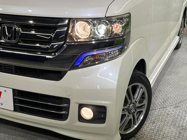 Ｎ－ＢＯＸカスタム Ｇ・Ｌパッケージ　電動スライドドア　純正ＳＤナビ　バックカメラ　衝突被害軽減システム　ドラレコ　スマートキー　ＨＩＤヘッド　ビルトインＥＴＣ　オートライト　オートエアコン　純正１４インチアルミ（12枚目）