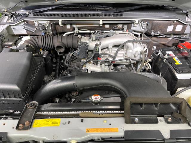 パジェロ ロング エクシード 4WD 純正SDナビ バックカメラ 禁煙車 ドラレコ HIDヘッド ETC クルコン オートライト オートエアコン 純正17インチアルミ Bluetooth CD DVD再生 フルセグ HIDフォグ(19枚目)