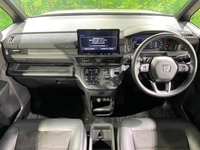 ステップワゴン e:HEVスパーダ プレミアムライン 両側電動ドア 純正SDナビ 後席モニター 全周囲カメラ 衝突被害軽減システム レーダークルーズ 禁煙車 電動リアゲート ハーフレザーシート ドラレコ コーナーセンサー スマートキー LEDヘッド(2枚目)