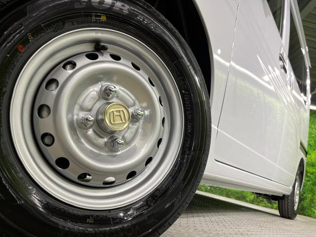 N-VAN G 届出済未使用車 衝突被害軽減システム アダプティングクルーズコントロー 禁煙車 スマートキー 車線逸脱警報 オートライト オートエアコン 純正12インチスチールホイール 横滑り防止装置(13枚目)