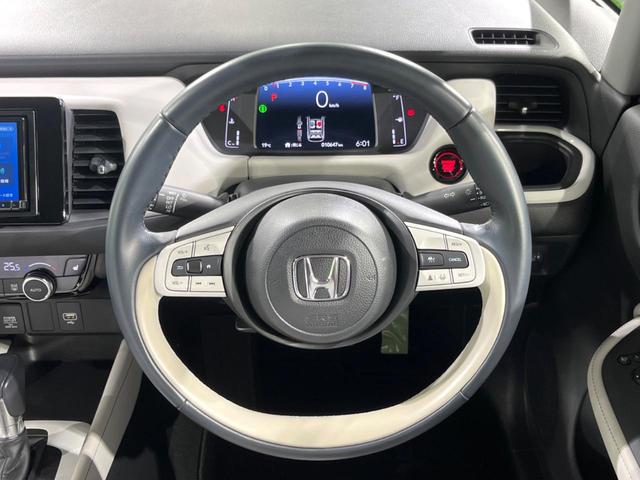 フィット ホーム バックカメラ 衝突被害軽減システム レーダークルーズ 禁煙車 ハーフレザーシート コーナーセンサー スマートキー LEDヘッド ETC オートハイビーム 車線逸脱警報 オートライト オートエアコン(11枚目)