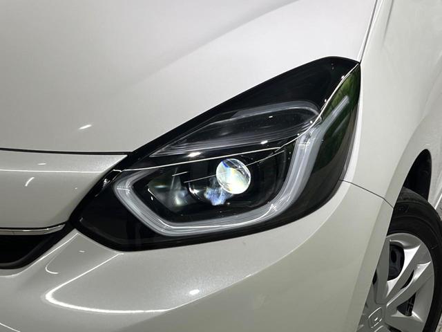 フィット ホーム バックカメラ 衝突被害軽減システム レーダークルーズ 禁煙車 ハーフレザーシート コーナーセンサー スマートキー LEDヘッド ETC オートハイビーム 車線逸脱警報 オートライト オートエアコン(12枚目)