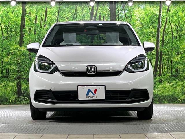 フィット ホーム バックカメラ 衝突被害軽減システム レーダークルーズ 禁煙車 ハーフレザーシート コーナーセンサー スマートキー LEDヘッド ETC オートハイビーム 車線逸脱警報 オートライト オートエアコン(14枚目)