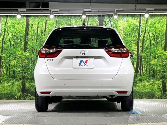 フィット ホーム バックカメラ 衝突被害軽減システム レーダークルーズ 禁煙車 ハーフレザーシート コーナーセンサー スマートキー LEDヘッド ETC オートハイビーム 車線逸脱警報 オートライト オートエアコン(15枚目)