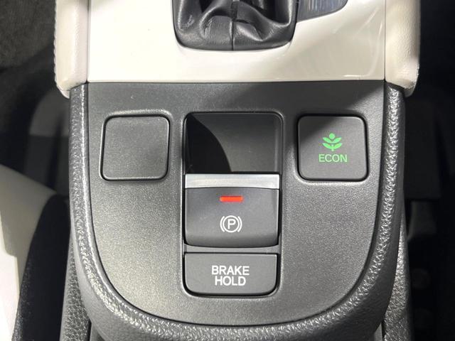 フィット ホーム バックカメラ 衝突被害軽減システム レーダークルーズ 禁煙車 ハーフレザーシート コーナーセンサー スマートキー LEDヘッド ETC オートハイビーム 車線逸脱警報 オートライト オートエアコン(35枚目)