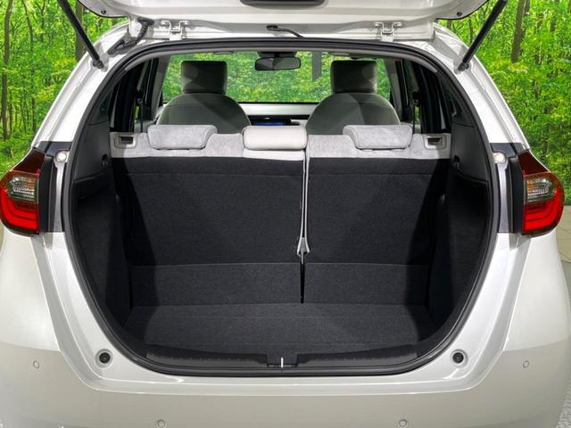 フィット ホーム バックカメラ 衝突被害軽減システム レーダークルーズ 禁煙車 ハーフレザーシート コーナーセンサー スマートキー LEDヘッド ETC オートハイビーム 車線逸脱警報 オートライト オートエアコン(37枚目)