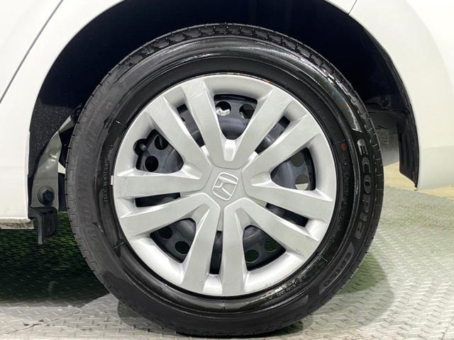 フィット ホーム バックカメラ 衝突被害軽減システム レーダークルーズ 禁煙車 ハーフレザーシート コーナーセンサー スマートキー LEDヘッド ETC オートハイビーム 車線逸脱警報 オートライト オートエアコン(49枚目)