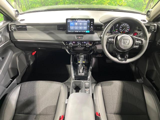 ヴェゼル e:HEV Z 全周囲カメラ 衝突被害軽減システム 電動リアゲート ハーフレザーシート コーナーセンサー スマートキー LEDヘッド 純正18インチアルミ オートハイビーム 車線逸脱警報 オートライト(2枚目)