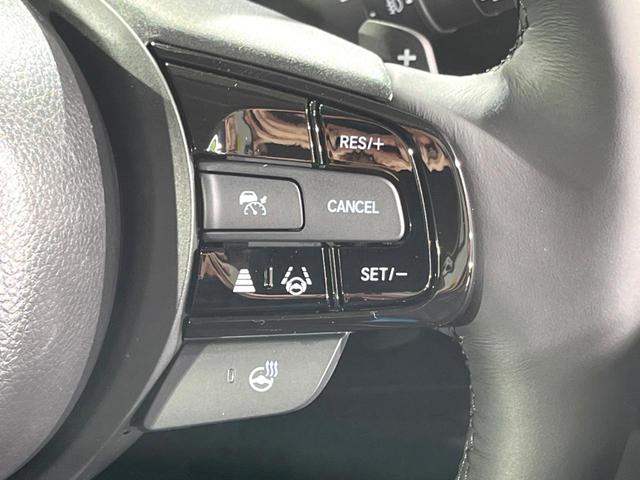 ヴェゼル e:HEV Z 全周囲カメラ 衝突被害軽減システム 電動リアゲート ハーフレザーシート コーナーセンサー スマートキー LEDヘッド 純正18インチアルミ オートハイビーム 車線逸脱警報 オートライト(6枚目)