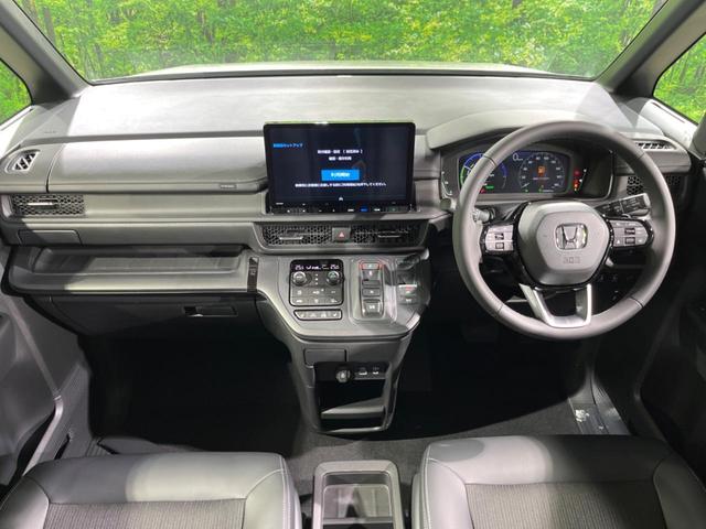 ステップワゴン e:HEVスパーダ 両側電動ドア バックカメラ 衝突被害軽減システム レーダークルーズ 電動リアゲート ハーフレザーシート コーナーセンサー スマートキー LEDヘッド 純正16インチアルミ オートハイビーム(2枚目)