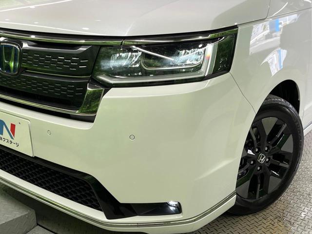 ステップワゴン e:HEVスパーダ 両側電動ドア バックカメラ 衝突被害軽減システム レーダークルーズ 電動リアゲート ハーフレザーシート コーナーセンサー スマートキー LEDヘッド 純正16インチアルミ オートハイビーム(13枚目)