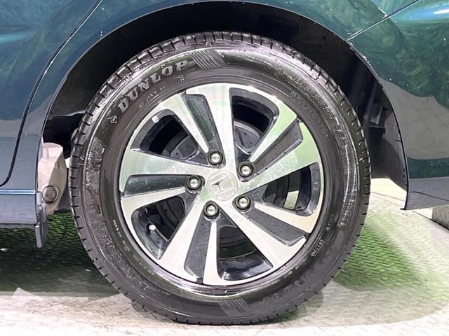 フリード G・ホンダセンシング 9インチナビ バックカメラ 両側パワースライドドア ホンダセンシング レーダークルーズコントロール スマートキー ドライブレコーダー ETC オートエアコン オートライト ステアリングスイッチ(13枚目)