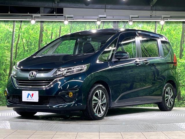 フリード G・ホンダセンシング 9インチナビ バックカメラ 両側パワースライドドア ホンダセンシング レーダークルーズコントロール スマートキー ドライブレコーダー ETC オートエアコン オートライト ステアリングスイッチ(16枚目)