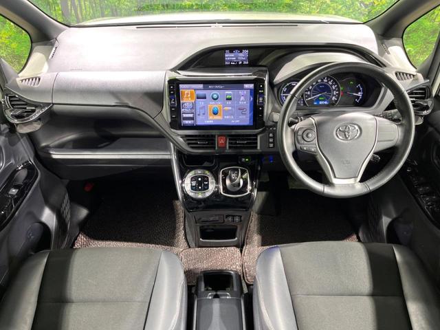 ノア ハイブリッドSi ダブルバイビーII 両側電動ドア SDナビ 後席モニター バックカメラ 衝突被害軽減システム 禁煙車 ハーフレザーシート ドラレコ コーナーセンサー スマートキー LEDヘッド ビルトインETC クルコン(2枚目)