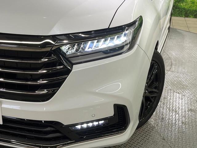 オデッセイハイブリッド ｅ：ＨＥＶアブソルート・ＥＸ　純正１０型ナビ　両側電動ドア　全周囲カメラ　衝突被害軽減システム　レーダークルーズ　ハーフレザーシート　ドラレコ　コーナーセンサー　スマートキー　ＬＥＤヘッド　ＥＴＣ２．０　純正１８インチアルミ（13枚目）