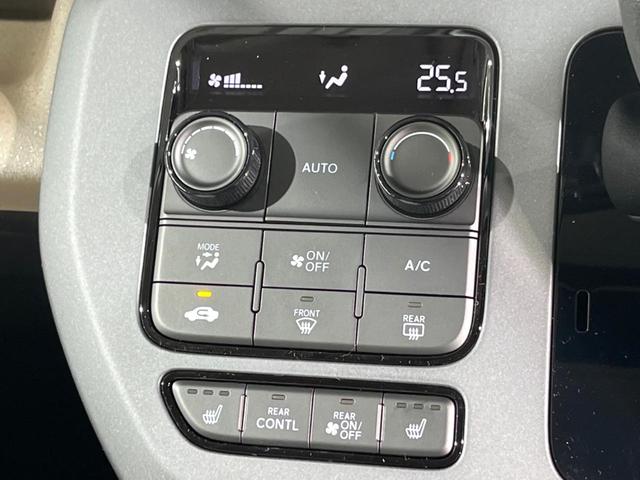 フリード ｅ：ＨＥＶエアー　ＥＸ　登録済未使用車　両側電動ドア　衝突被害軽減システム　レーダークルーズ　ハーフレザーシート　コーナーセンサー　スマートキー　純正１５インチアルミ　オートハイビーム　車線逸脱警報　オートライト（6枚目）