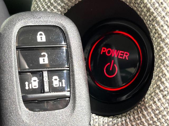 フリード ｅ：ＨＥＶエアー　ＥＸ　登録済未使用車　両側電動ドア　衝突被害軽減システム　レーダークルーズ　ハーフレザーシート　コーナーセンサー　スマートキー　純正１５インチアルミ　オートハイビーム　車線逸脱警報　オートライト（23枚目）