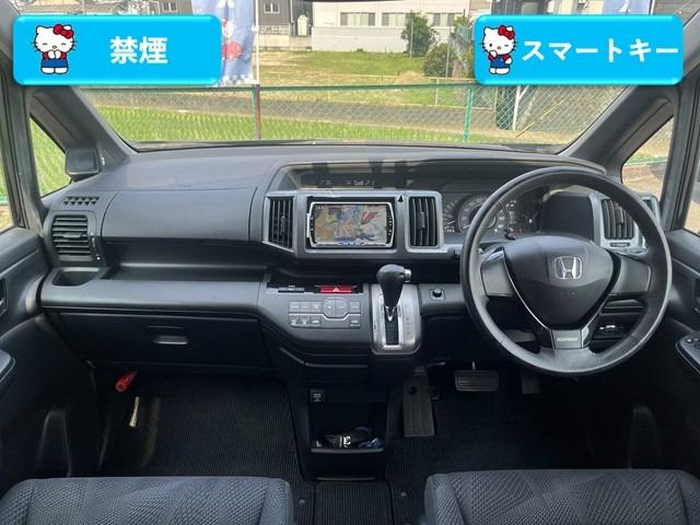 ステップワゴンスパーダ Ｓ　禁煙　スマートキーシステム　純正インターナビ　地デジテレビ　パワースライドドア　ＥＴＣ　ＨＩＤヘッドライト　ＢＴオーディオ　ＤＶＤ再生可　外１８インチＡＷ　テイン車高調（6枚目）