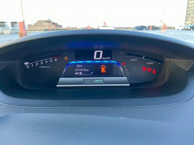 フリードハイブリッド ジャストセレクション バックモニター・両側パワースライドドア・地デジ対応ナビ・クルーズコントロール・ビルトインETC・アルパイン後席モニター・スマートキー・黒半皮シート・HDDナビ・(11枚目)