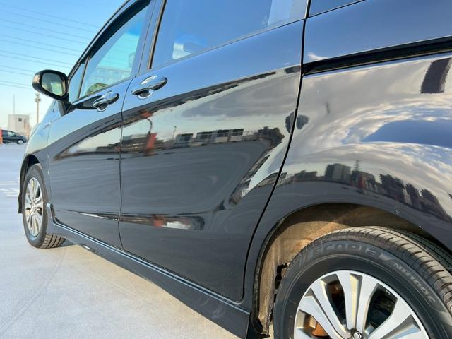 フリードハイブリッド ジャストセレクション バックモニター・両側パワースライドドア・地デジ対応ナビ・クルーズコントロール・ビルトインETC・アルパイン後席モニター・スマートキー・黒半皮シート・HDDナビ・(50枚目)