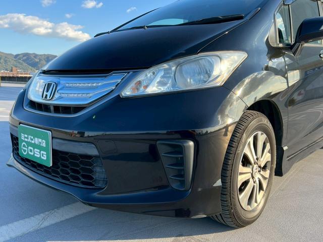 フリードハイブリッド ジャストセレクション バックモニター・両側パワースライドドア・地デジ対応ナビ・クルーズコントロール・ビルトインETC・アルパイン後席モニター・スマートキー・黒半皮シート・HDDナビ・(57枚目)