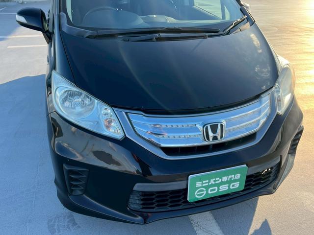 フリードハイブリッド ジャストセレクション バックモニター・両側パワースライドドア・地デジ対応ナビ・クルーズコントロール・ビルトインETC・アルパイン後席モニター・スマートキー・黒半皮シート・HDDナビ・(59枚目)