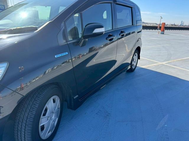 フリードハイブリッド 禁煙車・クルーズコントロール・BluetoothAudio対応・フルフラットシート・パワースライドドア・電動格納ミラー・ディスチャードランプ・ECONモードスイッチ(56枚目)