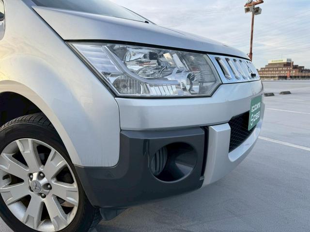 デリカＤ：５ Ｇ　ナビパッケージ　禁煙車・クルーズコントロール・３列シート・フルフラットシート・ＥＴＣ・純正１８インチイルミ・純正キセノンライト・カラーバックモニター・パワースライドドア・純正ナビ（12枚目）