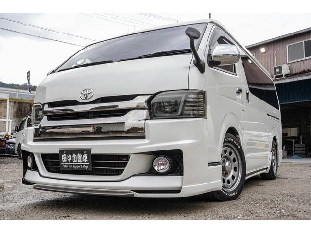 ハイエースバン スーパーＧＬ　ダークプライム　社外ナビ／フルゼク／バックカメラ／ＥＴＣ／ローダウン／エアロパーツ「フロント、リア、サイド」／デイトナホイール／ベッドキット／社外ヘッドライト／社外テールランプ／後席モニター／両側パワースライドドア（2枚目）