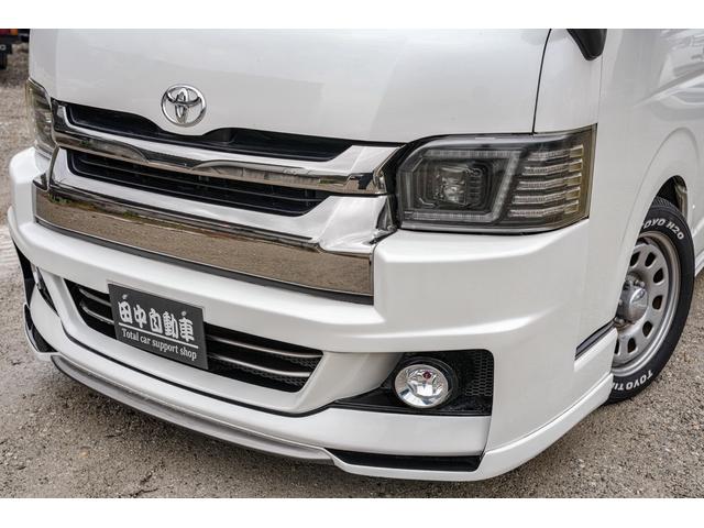 ハイエースバン スーパーＧＬ　ダークプライム　社外ナビ／フルゼク／バックカメラ／ＥＴＣ／ローダウン／エアロパーツ「フロント、リア、サイド」／デイトナホイール／ベッドキット／社外ヘッドライト／社外テールランプ／後席モニター／両側パワースライドドア（5枚目）