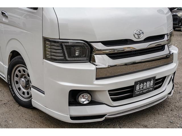 ハイエースバン スーパーＧＬ　ダークプライム　社外ナビ／フルゼク／バックカメラ／ＥＴＣ／ローダウン／エアロパーツ「フロント、リア、サイド」／デイトナホイール／ベッドキット／社外ヘッドライト／社外テールランプ／後席モニター／両側パワースライドドア（12枚目）