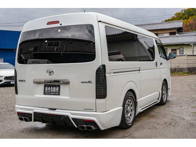 ハイエースバン スーパーＧＬ　ダークプライム　社外ナビ／フルゼク／バックカメラ／ＥＴＣ／ローダウン／エアロパーツ「フロント、リア、サイド」／デイトナホイール／ベッドキット／社外ヘッドライト／社外テールランプ／後席モニター／両側パワースライドドア（18枚目）