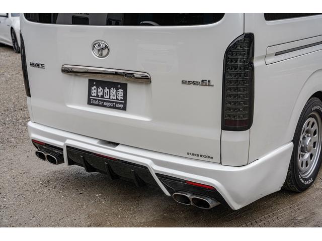 ハイエースバン スーパーＧＬ　ダークプライム　社外ナビ／フルゼク／バックカメラ／ＥＴＣ／ローダウン／エアロパーツ「フロント、リア、サイド」／デイトナホイール／ベッドキット／社外ヘッドライト／社外テールランプ／後席モニター／両側パワースライドドア（20枚目）