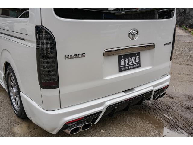 ハイエースバン スーパーＧＬ　ダークプライム　社外ナビ／フルゼク／バックカメラ／ＥＴＣ／ローダウン／エアロパーツ「フロント、リア、サイド」／デイトナホイール／ベッドキット／社外ヘッドライト／社外テールランプ／後席モニター／両側パワースライドドア（28枚目）