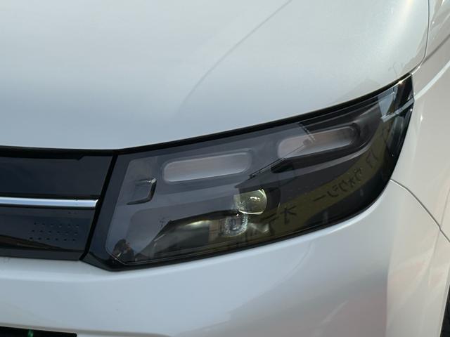 フリード ｅ：ＨＥＶエアー　純正１５インチホイール！両側電動スライドドア！バックカメラ！３列シート！オートエアコン！衝突軽減ブレーキ！電動パーキング！クルーズコントロール！ＬＥＤヘッドライト！（7枚目）