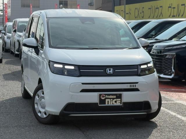 フリード ｅ：ＨＥＶエアー　純正１５インチホイール！両側電動スライドドア！バックカメラ！３列シート！オートエアコン！衝突軽減ブレーキ！電動パーキング！クルーズコントロール！ＬＥＤヘッドライト！（9枚目）