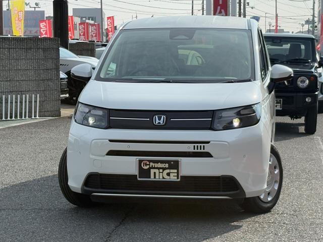 フリード ｅ：ＨＥＶエアー　純正１５インチホイール！両側電動スライドドア！バックカメラ！３列シート！オートエアコン！衝突軽減ブレーキ！電動パーキング！クルーズコントロール！ＬＥＤヘッドライト！（11枚目）