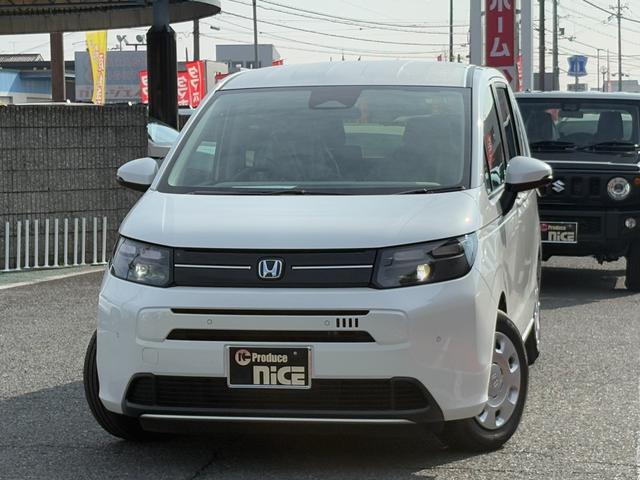 フリード ｅ：ＨＥＶエアー　純正１５インチホイール！両側電動スライドドア！バックカメラ！３列シート！オートエアコン！衝突軽減ブレーキ！電動パーキング！クルーズコントロール！ＬＥＤヘッドライト！（12枚目）