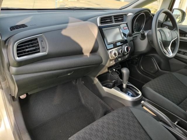 フィット １３Ｇ・Ｆパッケージ　純正ナビ／テレビ／ＢＴ接続可／ＣＤ／ＤＶＤ／ＥＴＣ／スマートキー／プッシュスタート／横滑り防止装置／アイドリングストップ／電格ミラー／集中ドアロック（49枚目）