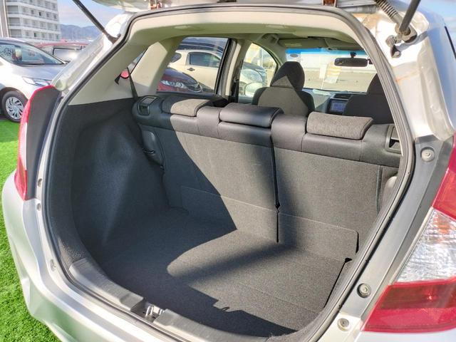 フィット １３Ｇ・Ｆパッケージ　純正ナビ／テレビ／ＢＴ接続可／ＣＤ／ＤＶＤ／ＥＴＣ／スマートキー／プッシュスタート／横滑り防止装置／アイドリングストップ／電格ミラー／集中ドアロック（63枚目）