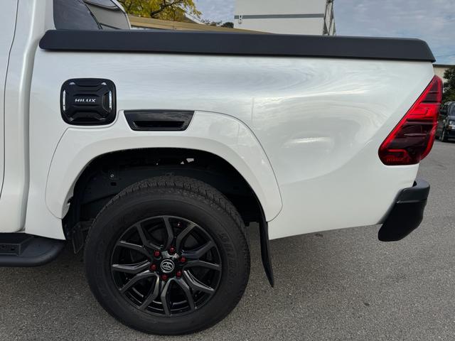 ハイラックス Ｚ　ＧＲスポーツ　ワンオーナー　ユーザー買取　８インチディスプレイオーディオ　ナビ　衝突軽減ブレーキ　全方位カメラ　ＬＥＤヘッドランプ　ハードトノカバー　ＧＲサイドステップ　ＧＲドレスアップマフラー　パールホワイト（36枚目）