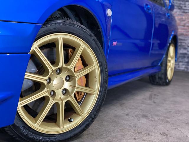 ＷＲＸ　ＳＴｉ　後期モデル・Ｂｒｅｍｂｏブレーキ・ＨＫＳエアクリ・マフラー・ナビＴＶ・Ｄｅｆｉブースト計・ＥＴＣ・ＨＩＤライト・キーレス・純正１７ＡＷ・禁煙・修復無(9枚目)