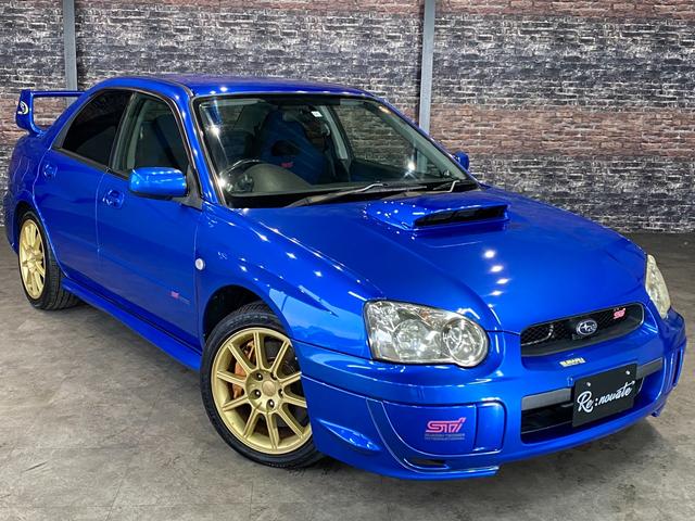 ＷＲＸ　ＳＴｉ　後期モデル・Ｂｒｅｍｂｏブレーキ・ＨＫＳエアクリ・マフラー・ナビＴＶ・Ｄｅｆｉブースト計・ＥＴＣ・ＨＩＤライト・キーレス・純正１７ＡＷ・禁煙・修復無(14枚目)