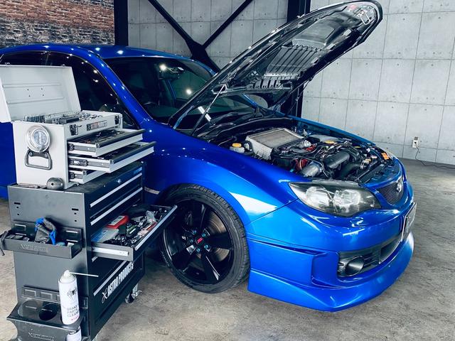 ＷＲＸ　ＳＴｉ　タイベル交換済・エンジンＯＨ済・ＢＲＩＴＺ車高調・ＶＡＲＩＳカーボンウイング＆カーボンボンネット・ＴＯＭＥＩエクストリームＴｉマフラー・ＣＨＡＲＧＥ　ＳＯＥＥＤエアロ・スマートキ・ＨＩＤ・禁煙・修復無(4枚目)