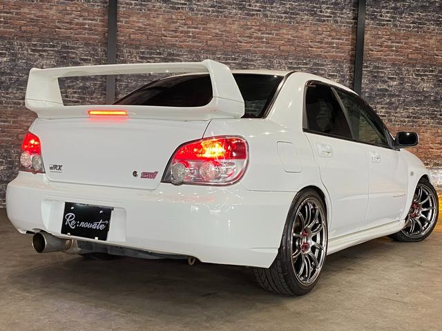 インプレッサ ＷＲＸ　ＳＴｉ　タイベル交換済・ＨＫＳ車高調・ＡＤＶＡＮ１８ＡＷ・ＦＵＪＩＴＳＵＢＯマフラー・Ｂｒｅｍｂｏブレーキ・Ｄｅｆｉ追加メーター・キーレス・ＨＩＤ・フォグＨＩＤ・禁煙・修復無（15枚目）