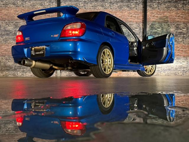 インプレッサ WRX STiリミテッド スバルAWD30周年記念モデル/Eg吸気効率UP/専用ECU/STIゲノムマフラー・3連追加メーター/リミテッド専用エアロパーツ/ファイナルスピード17AW/HDDナビ/CD/DVD/MD(6枚目)