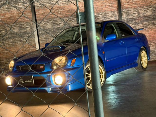 インプレッサ WRX STiリミテッド スバルAWD30周年記念モデル/Eg吸気効率UP/専用ECU/STIゲノムマフラー・3連追加メーター/リミテッド専用エアロパーツ/ファイナルスピード17AW/HDDナビ/CD/DVD/MD(7枚目)