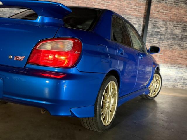 インプレッサ WRX STiリミテッド スバルAWD30周年記念モデル/Eg吸気効率UP/専用ECU/STIゲノムマフラー・3連追加メーター/リミテッド専用エアロパーツ/ファイナルスピード17AW/HDDナビ/CD/DVD/MD(8枚目)