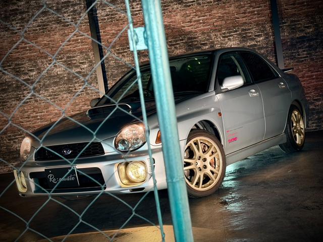 インプレッサ WRX STi HKSリーガマックスマフラー/HKSブースト計/HDDナビ/ターボタイマー/ETC/HIDヘッドライト/純正17インチアルミ/リモコンキー/AWD/6速マニュアル/ボクサーサウンド(7枚目)